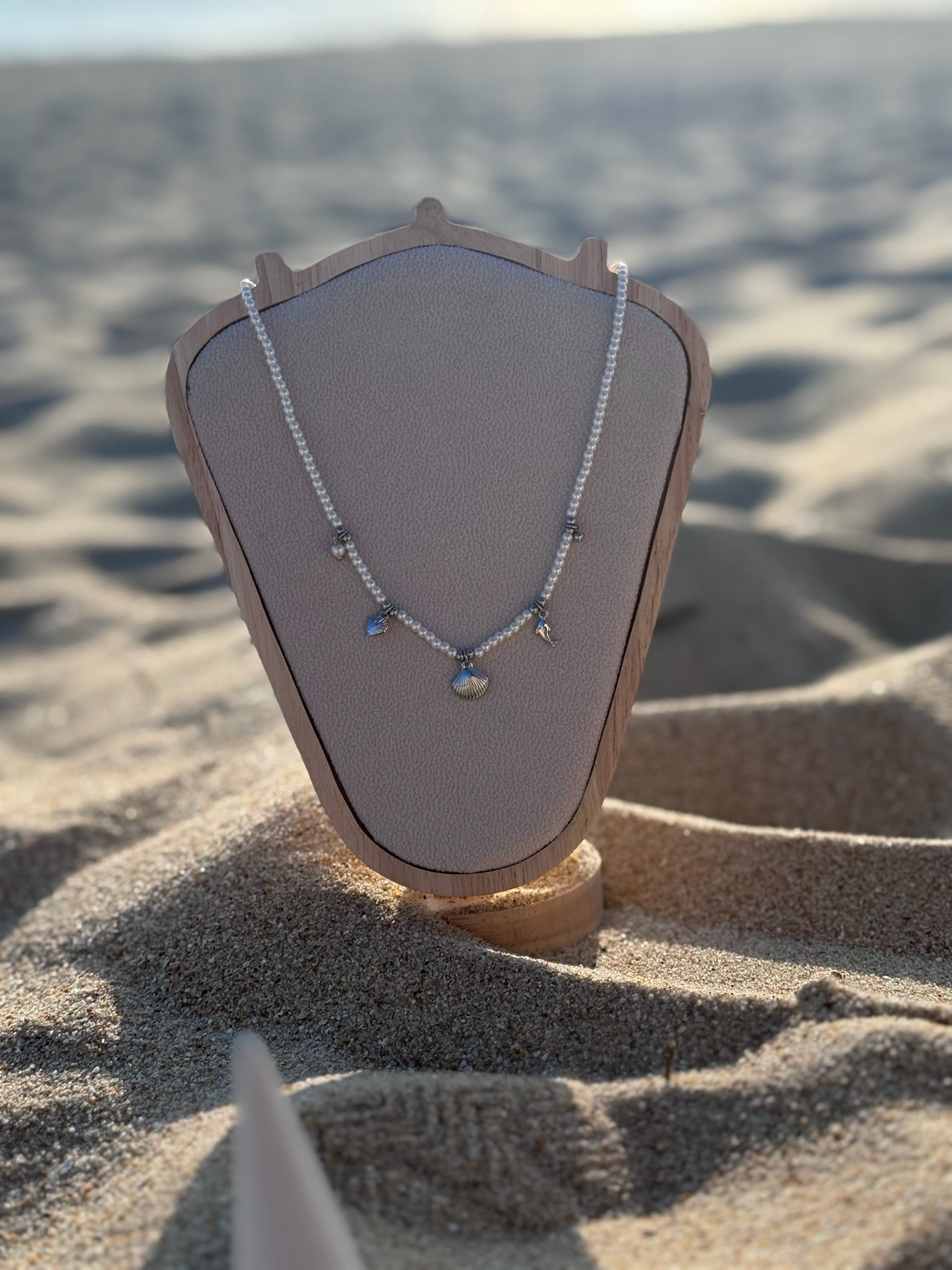 Colar Perolas com concha CHECK