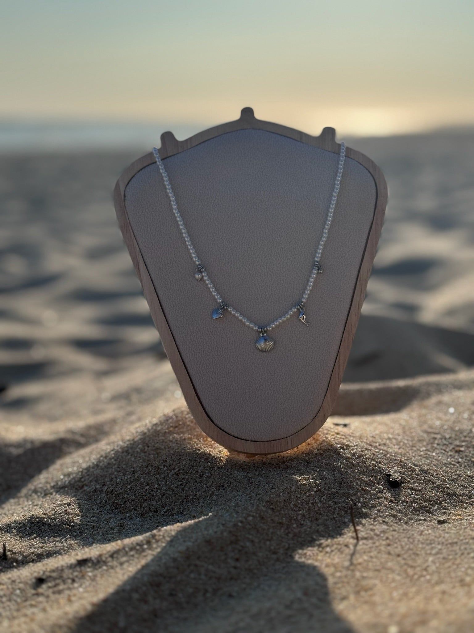 Colar Perolas com concha CHECK