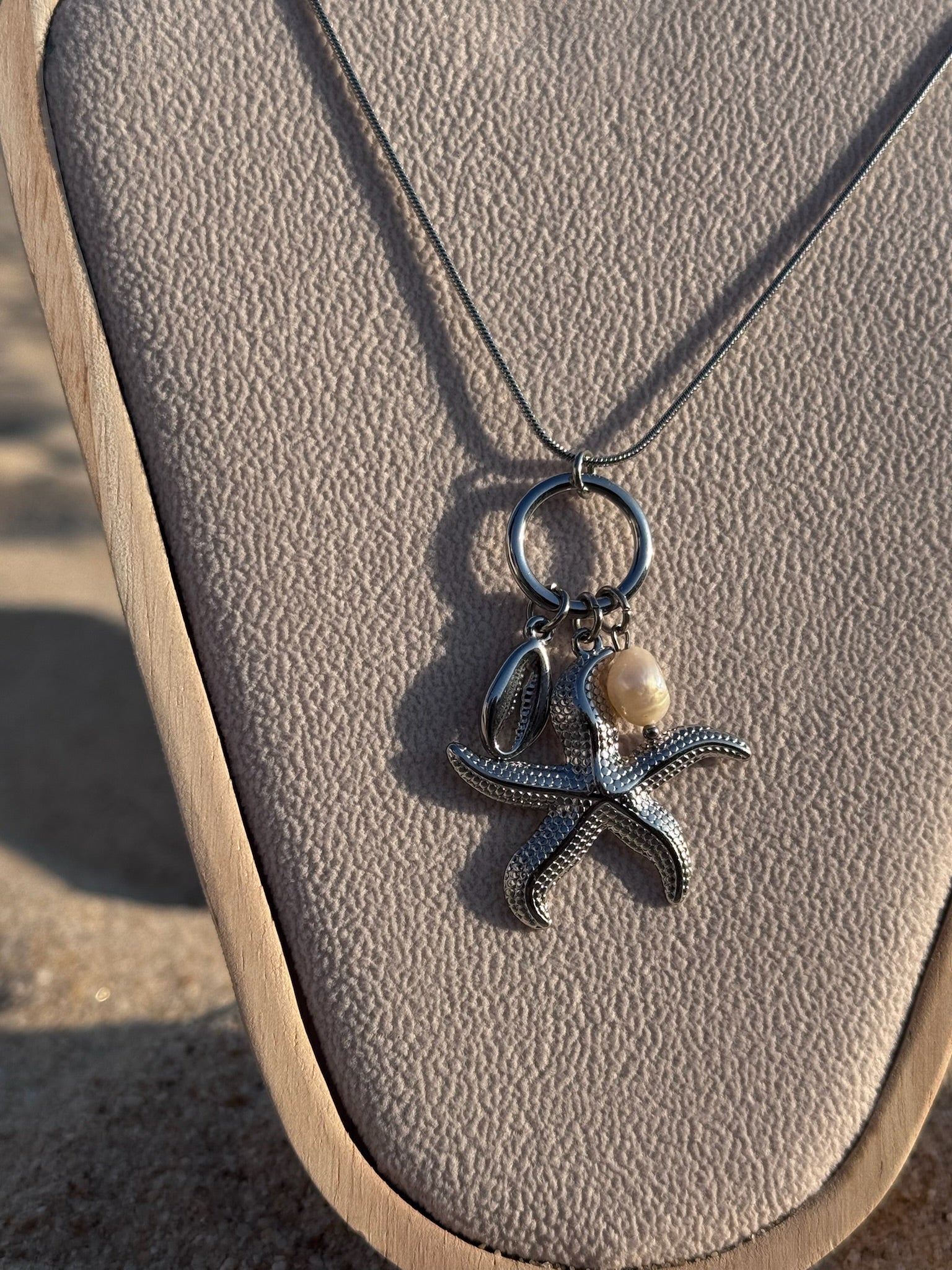 Colar Estrela Do Mar prateada CHECK