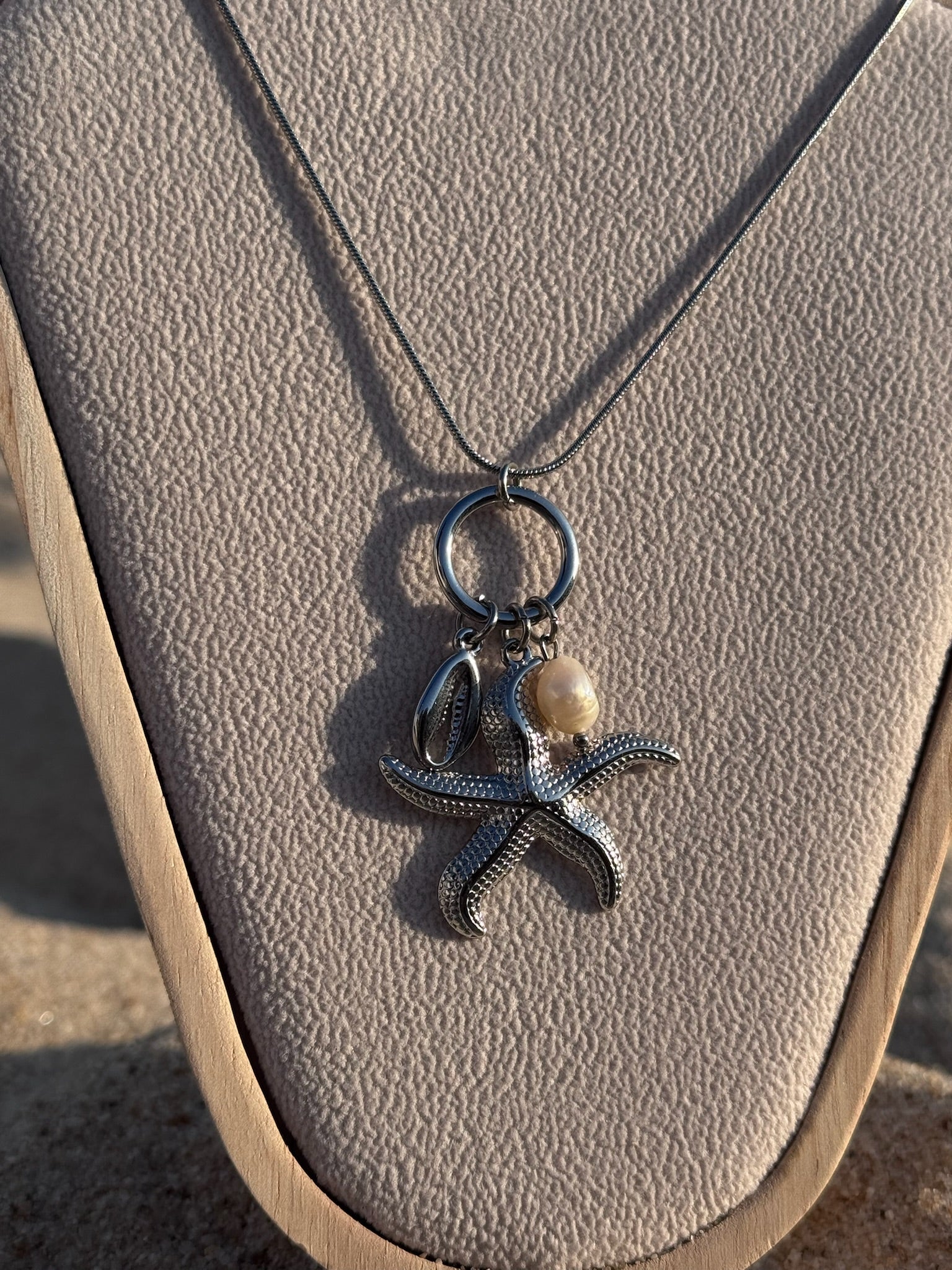 Colar Estrela Do Mar prateada CHECK