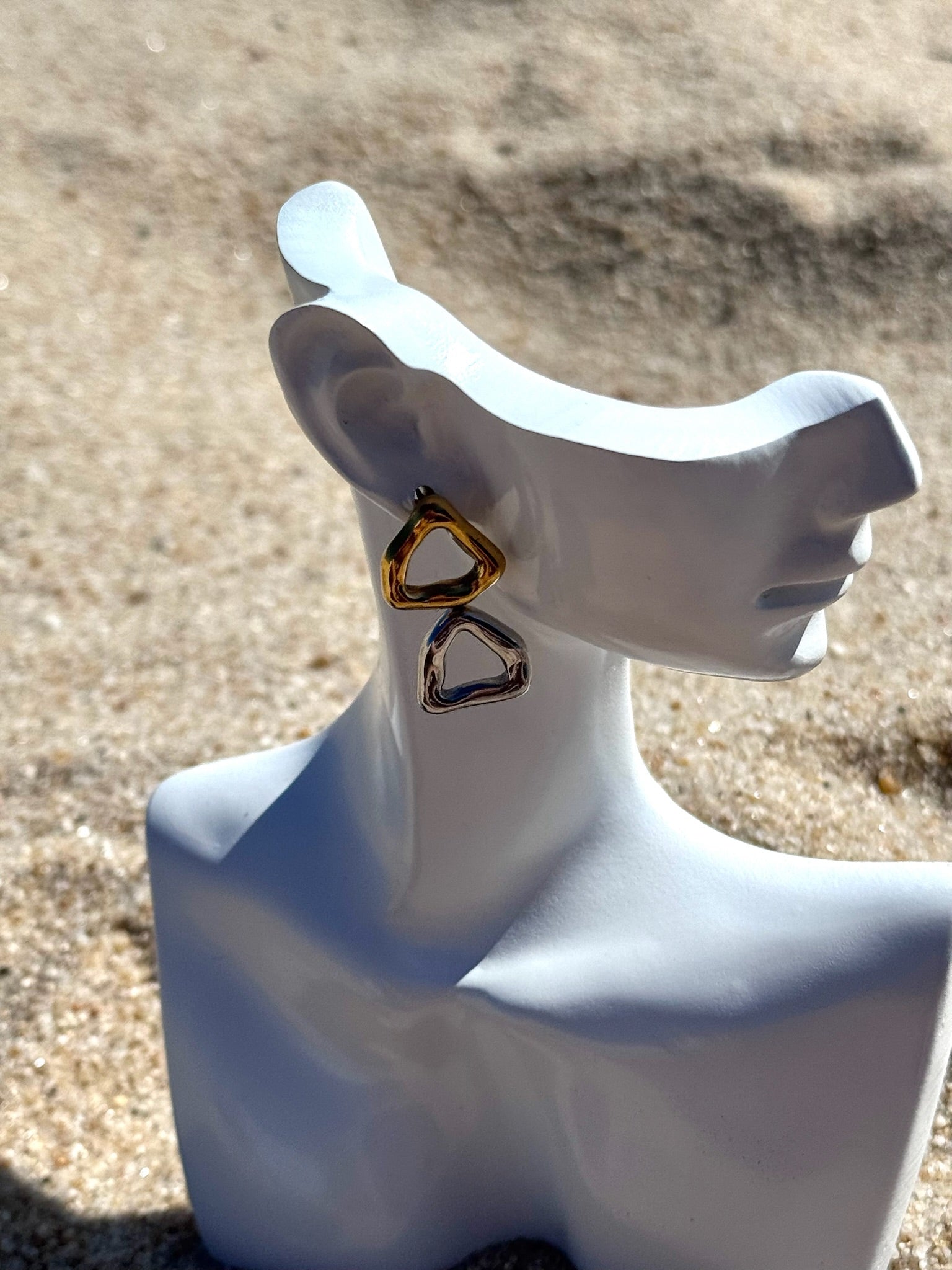 Brincos Triade CHECK