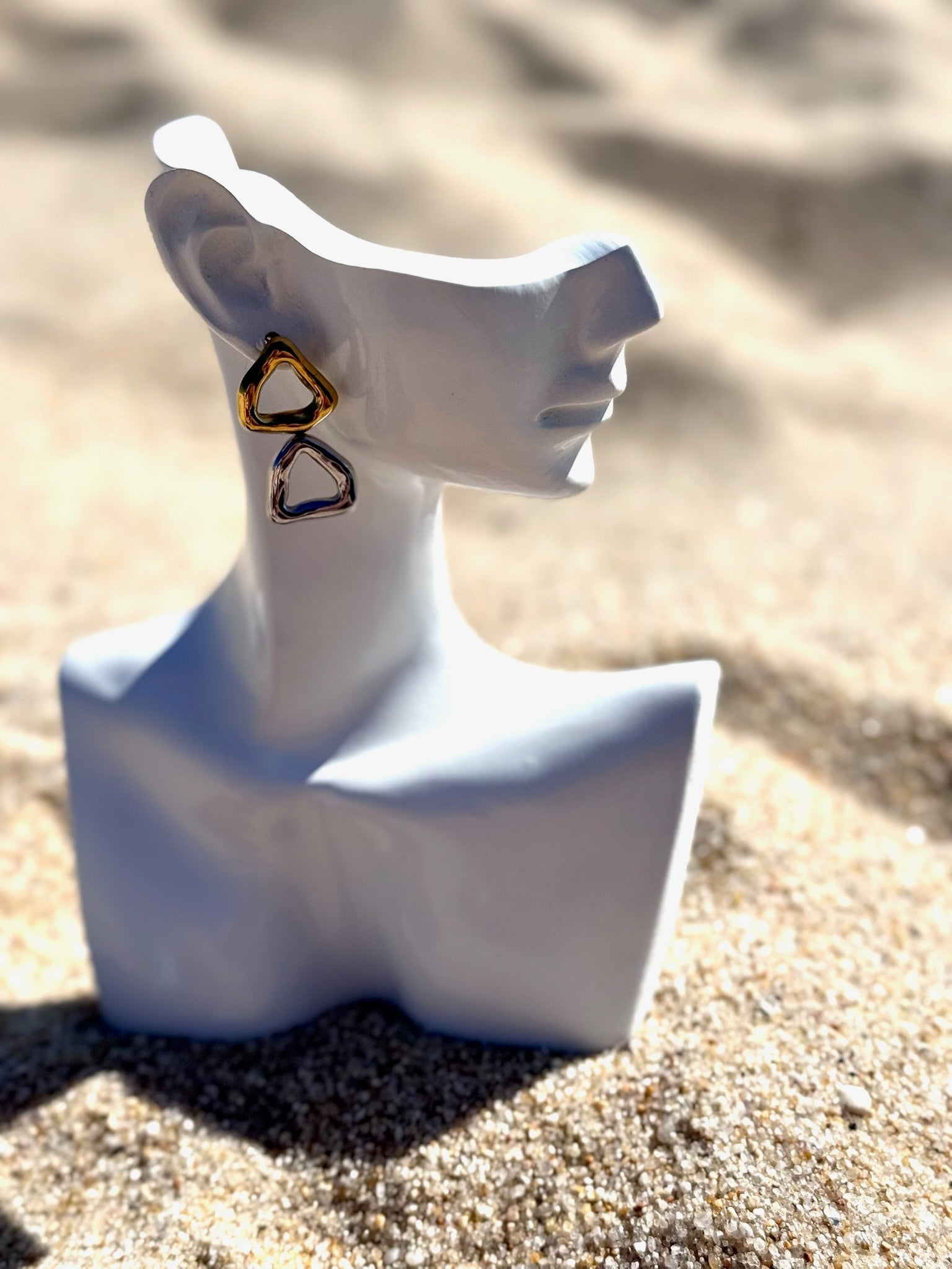 Brincos Triade CHECK