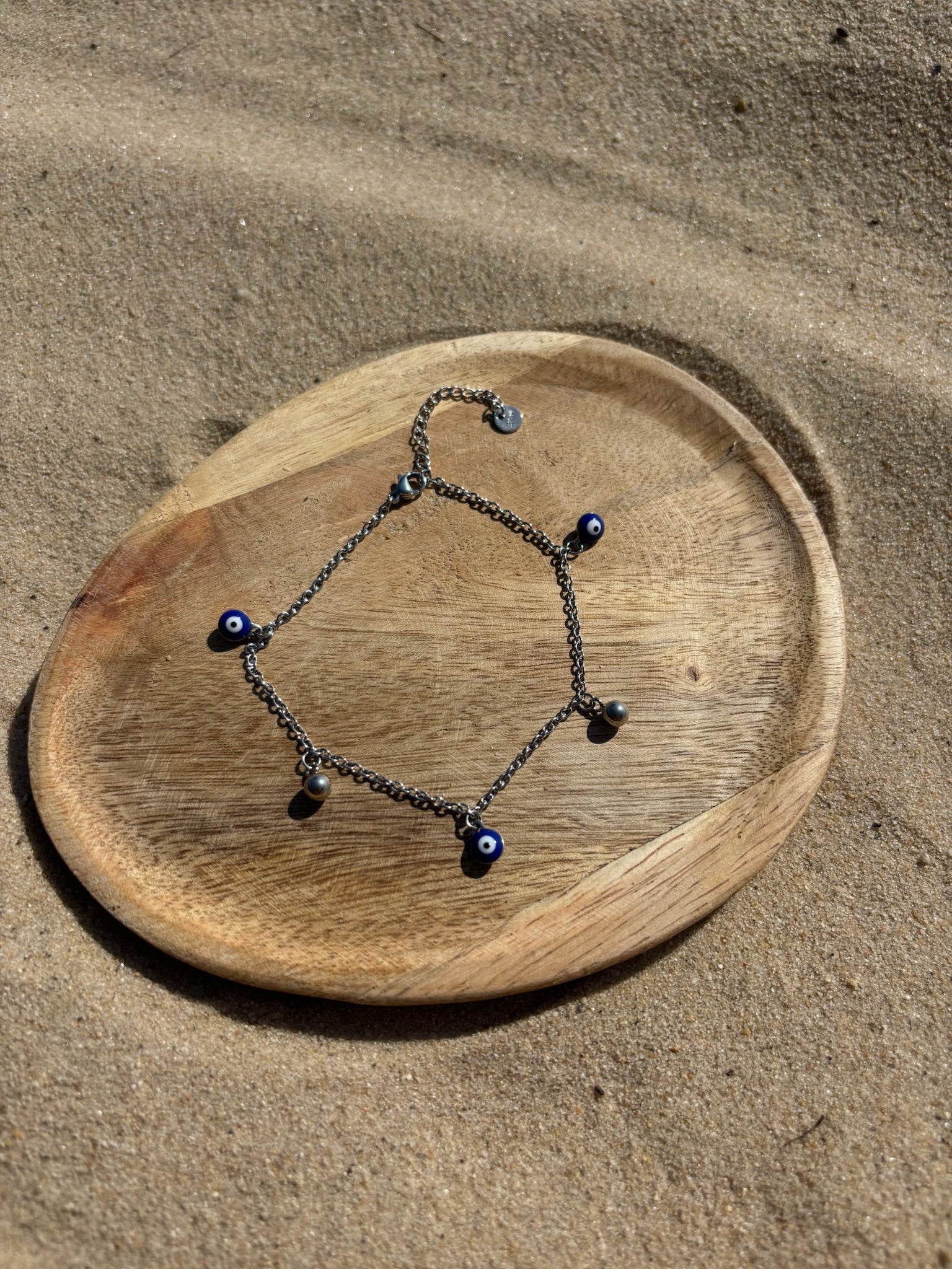 Pulseira de Pe olho CHECK 1