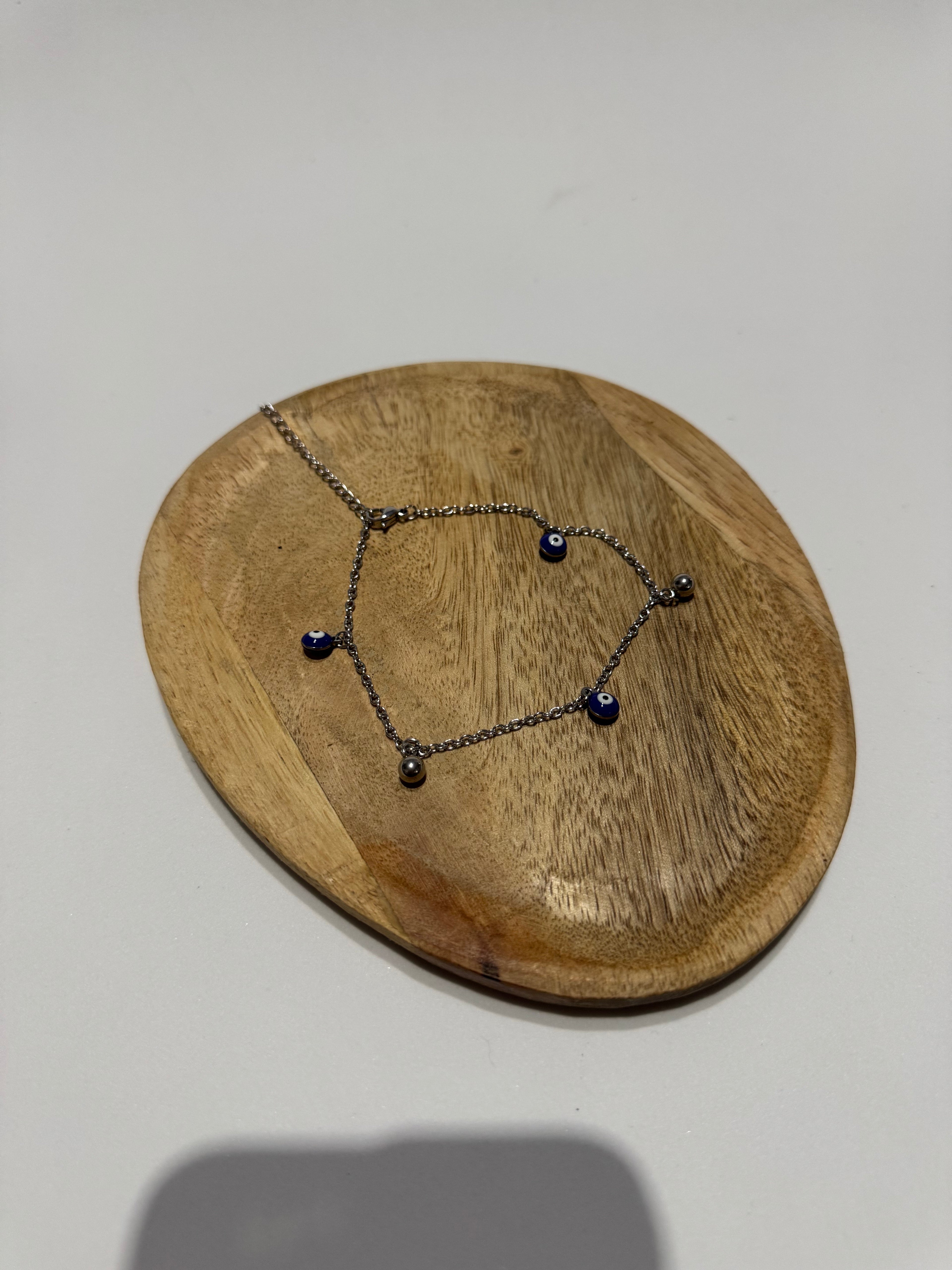 Pulseira de Pe olho CHECK 1