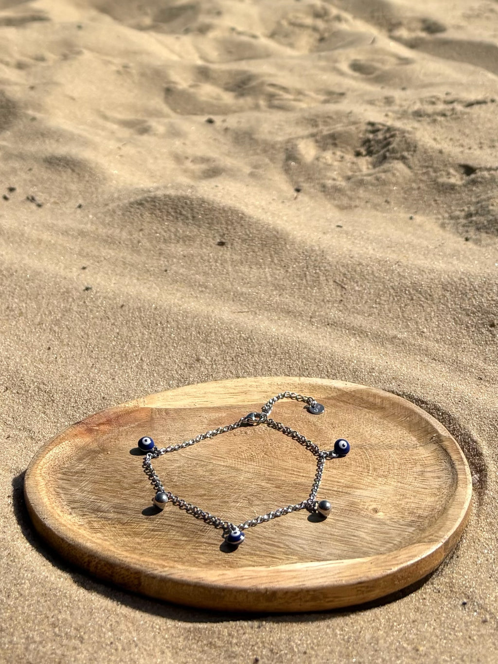 Pulseira de Pe olho CHECK 1