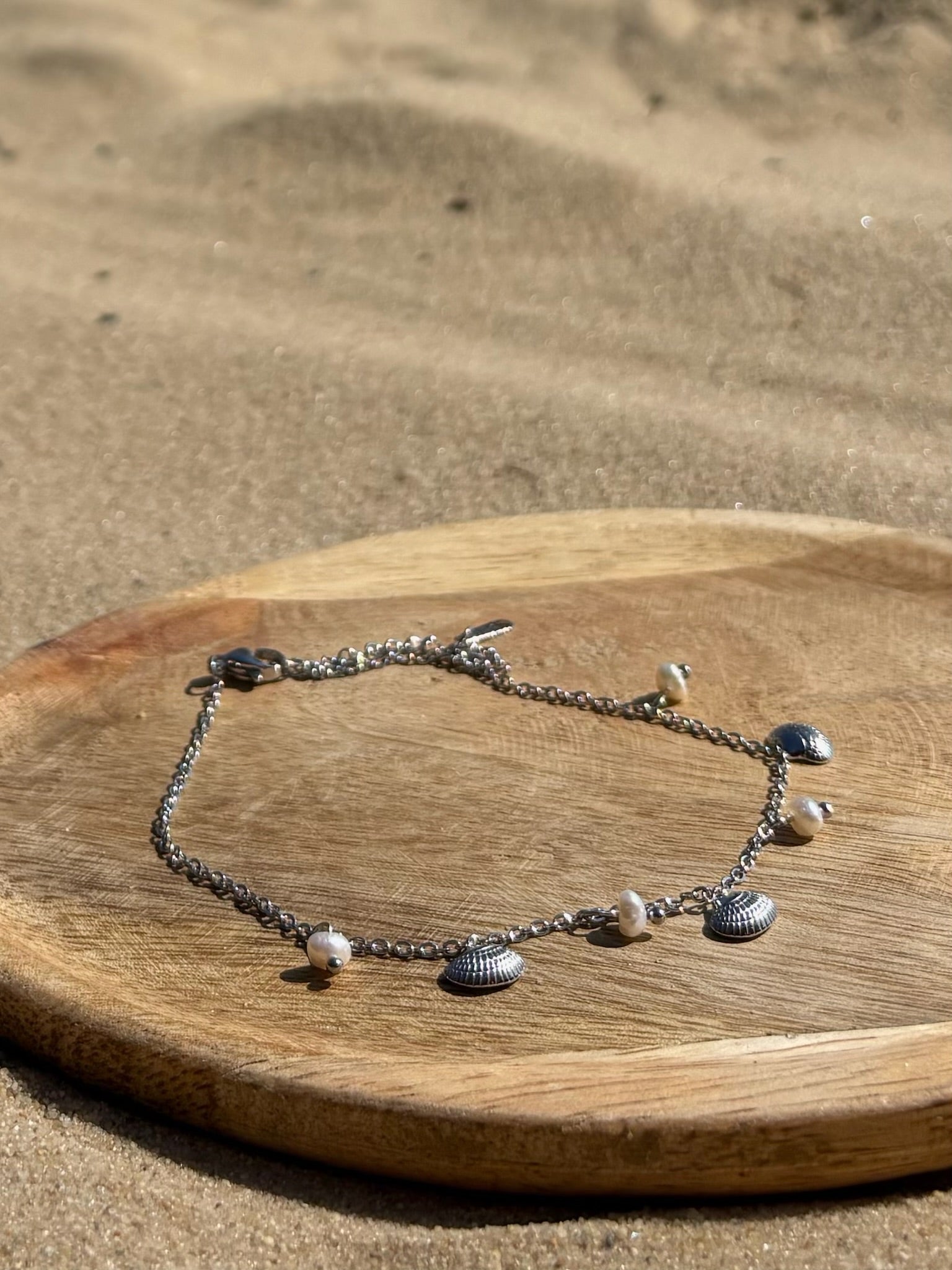 Pulseira de Pe concha prateada CHECK 1